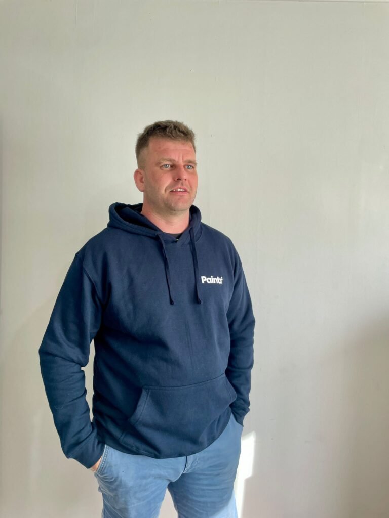 chris painter with blue hoodie